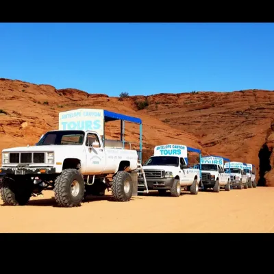 a truck is parked on the side of a mountain